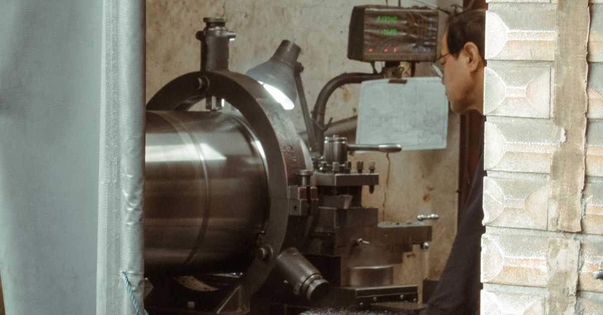 Parator Machine Machine Operator behind Wall · Free Stock Photo