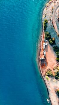 Stunning aerial view of Marmaris coastline with turquoise waters and beach in Turkey.