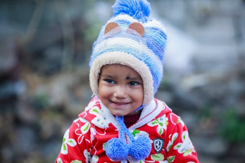 Cute Little Girl in Red Coat