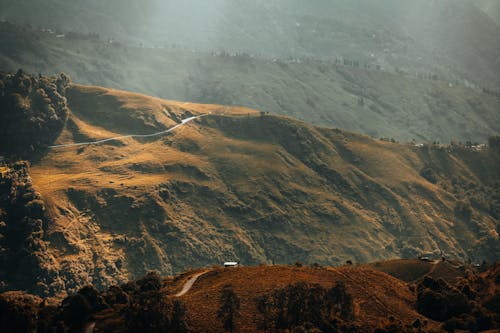 Безкоштовне стокове фото на тему «Аерофотозйомка, зелені гори, знімок із дрона»