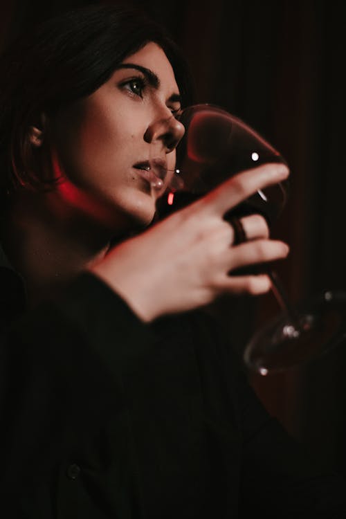 Woman Holding a Glass of Wine 