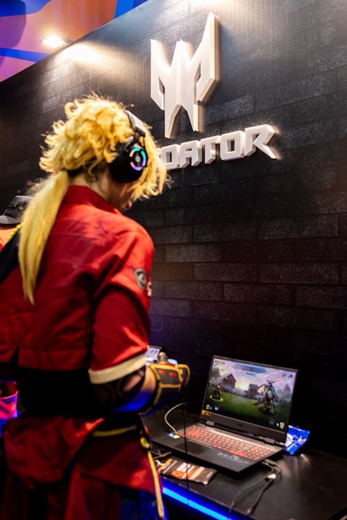 Person in a Cosplay Playing a Game at an Event 