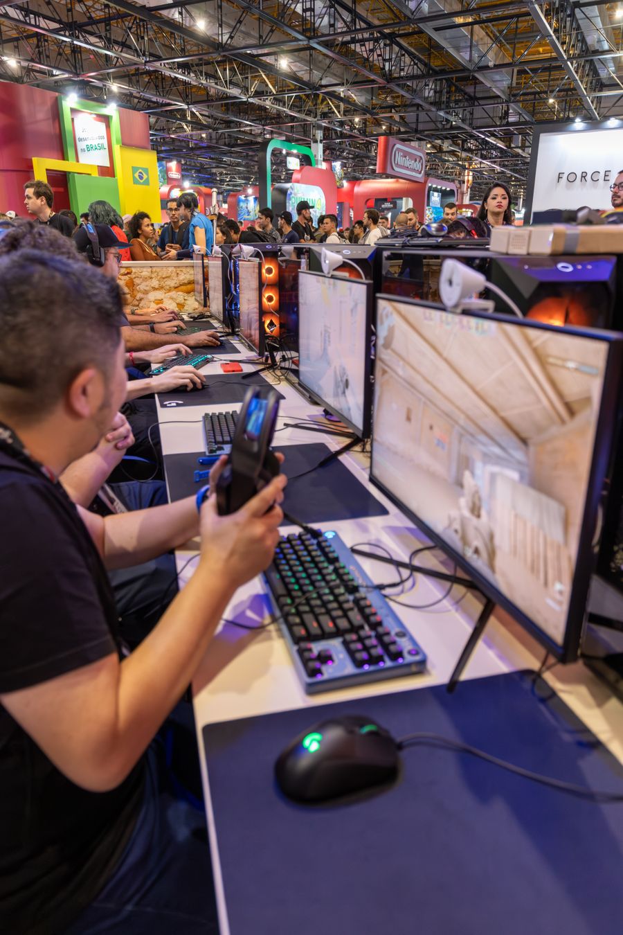 Gamers at a row of PCs on squad night