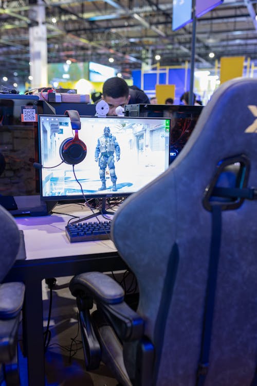 People Playing Computer Games at a Convention 