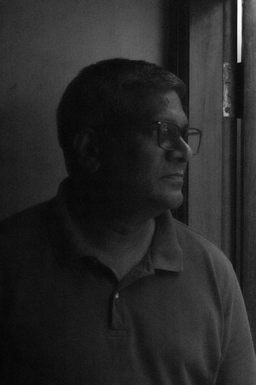 Indian man wearing glasses-black and white