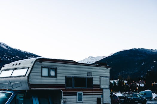 RV camping in snowy Whistler, BC with a stunning mountain backdrop.