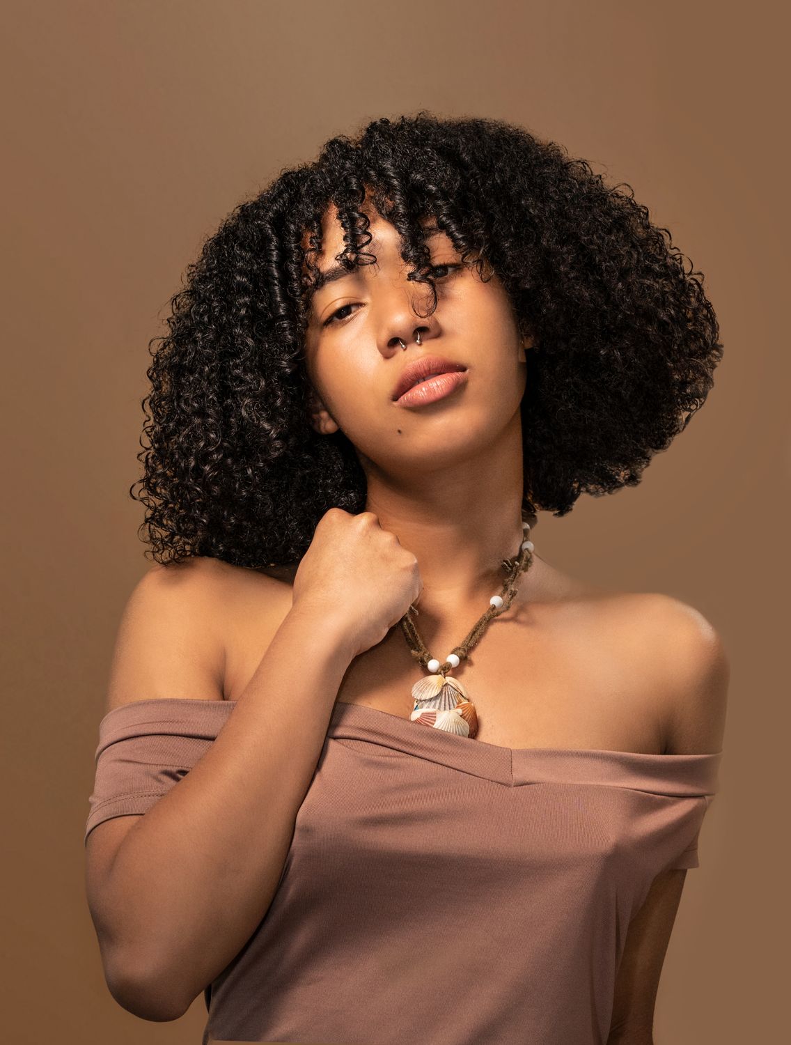 Portrait of Woman with Curly Hair · Free Stock Photo