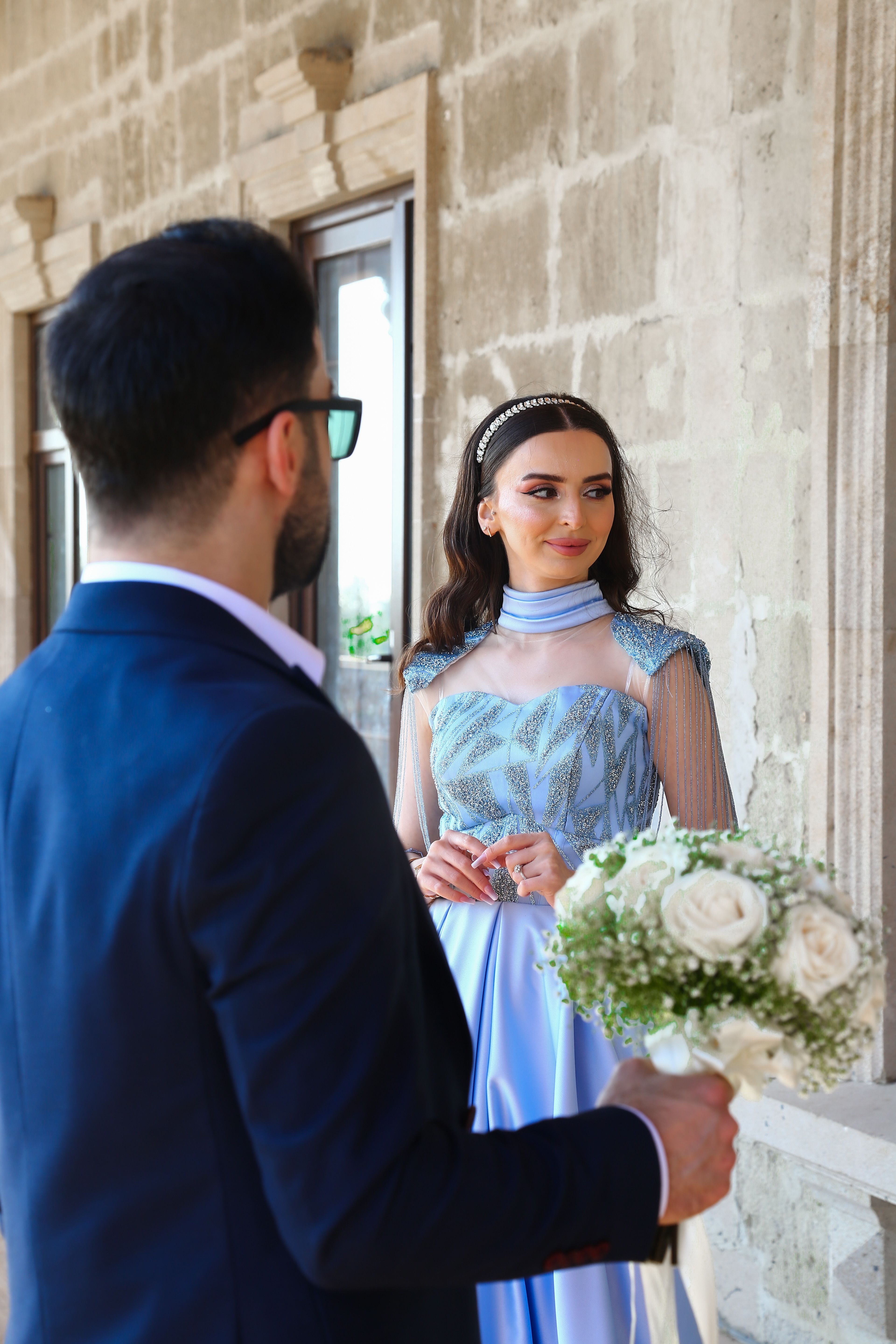 Bride and Groom Standing in front of a Building · Free Stock Photo