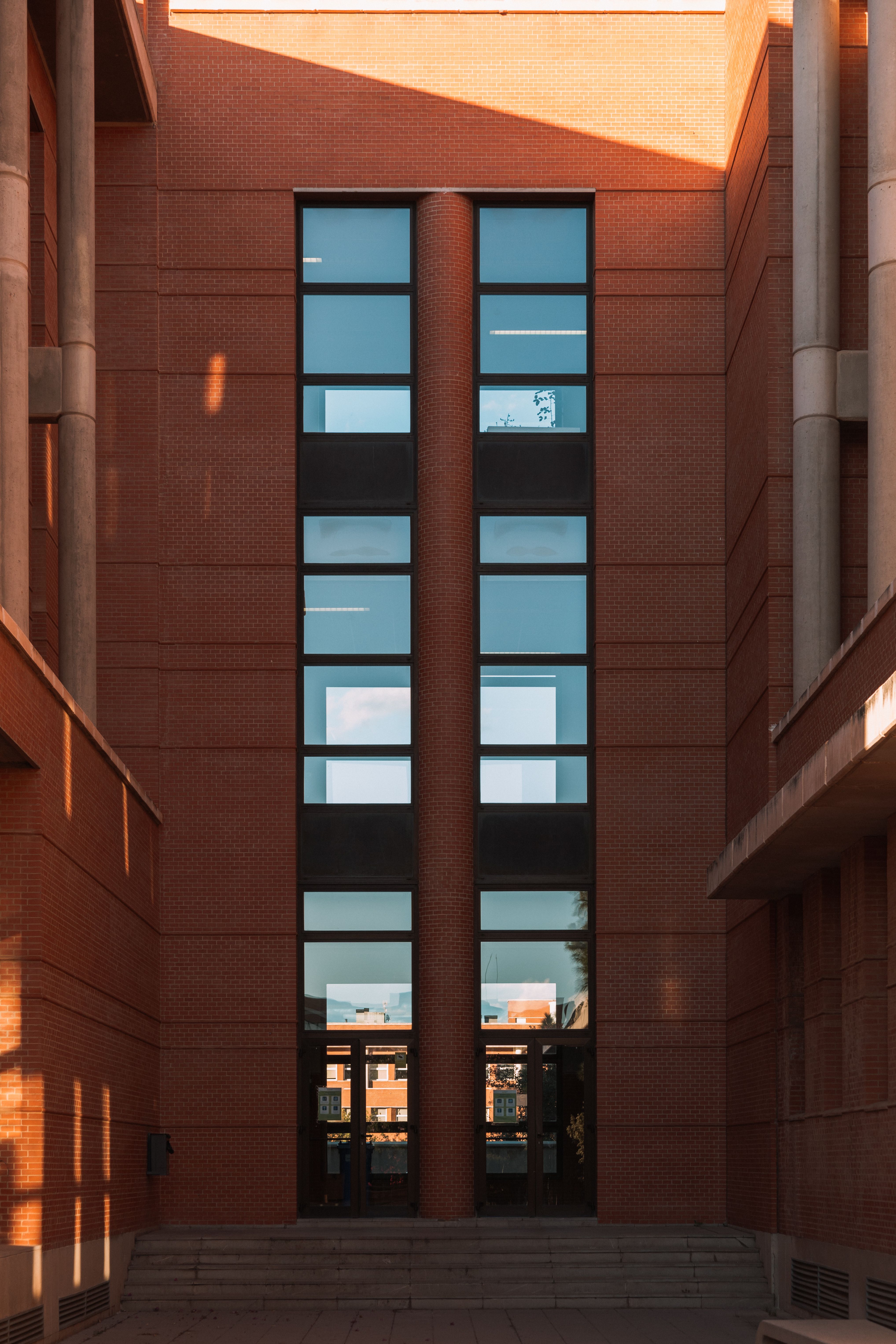 Facade of a Modern Building with Large Windows · Free Stock Photo