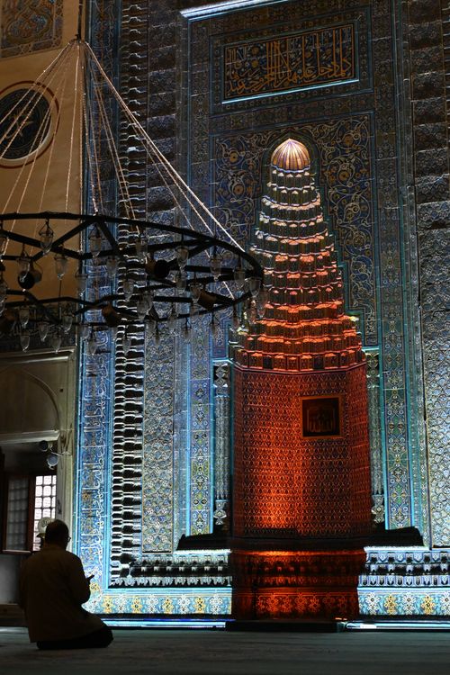 Free A man kneels in prayer at the ornate Yesil Mosque in Bursa, Turkey. Stock Photo