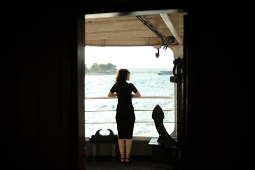 Woman Looking at the View of Sea on a Cruise Ship 