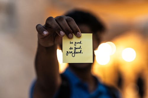 Free Hand Holding Sticky Note Stock Photo