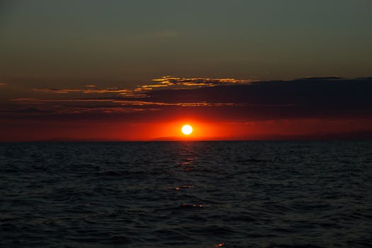 Beautiful sunset over the sea in Umag, Croatia, capturing vivid colors and serene horizon.