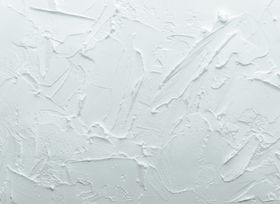 White textured surface with abstract pattern — photo by Steve A Johnson on Pexels