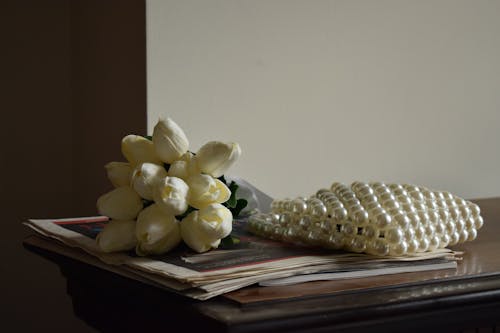 Bouquet of White Tulips on a Cabinet