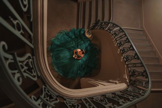 Woman Standing at the Bottom of the Stairs 