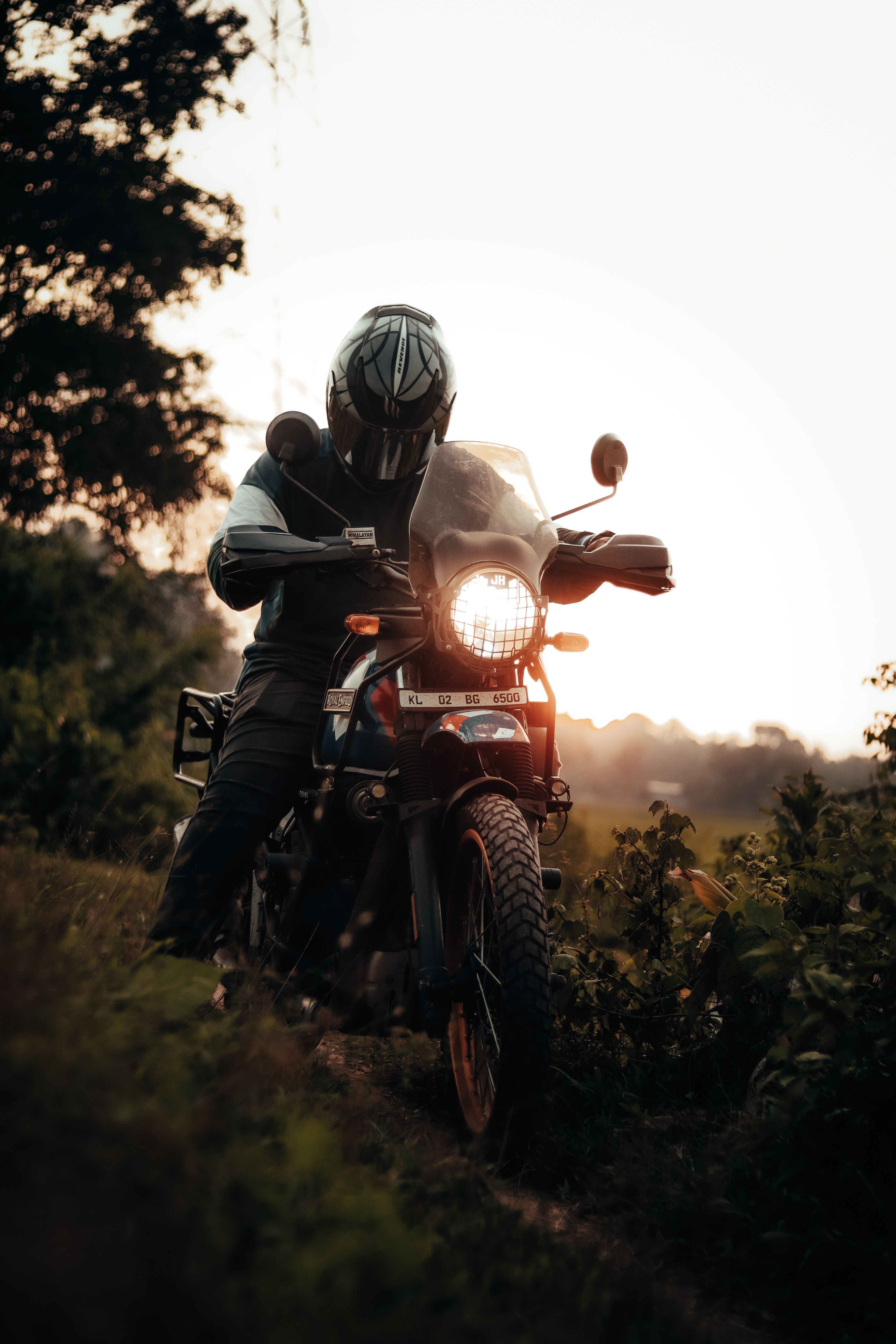 Man Riding a Motorcycle at Dusk · Free Stock Photo