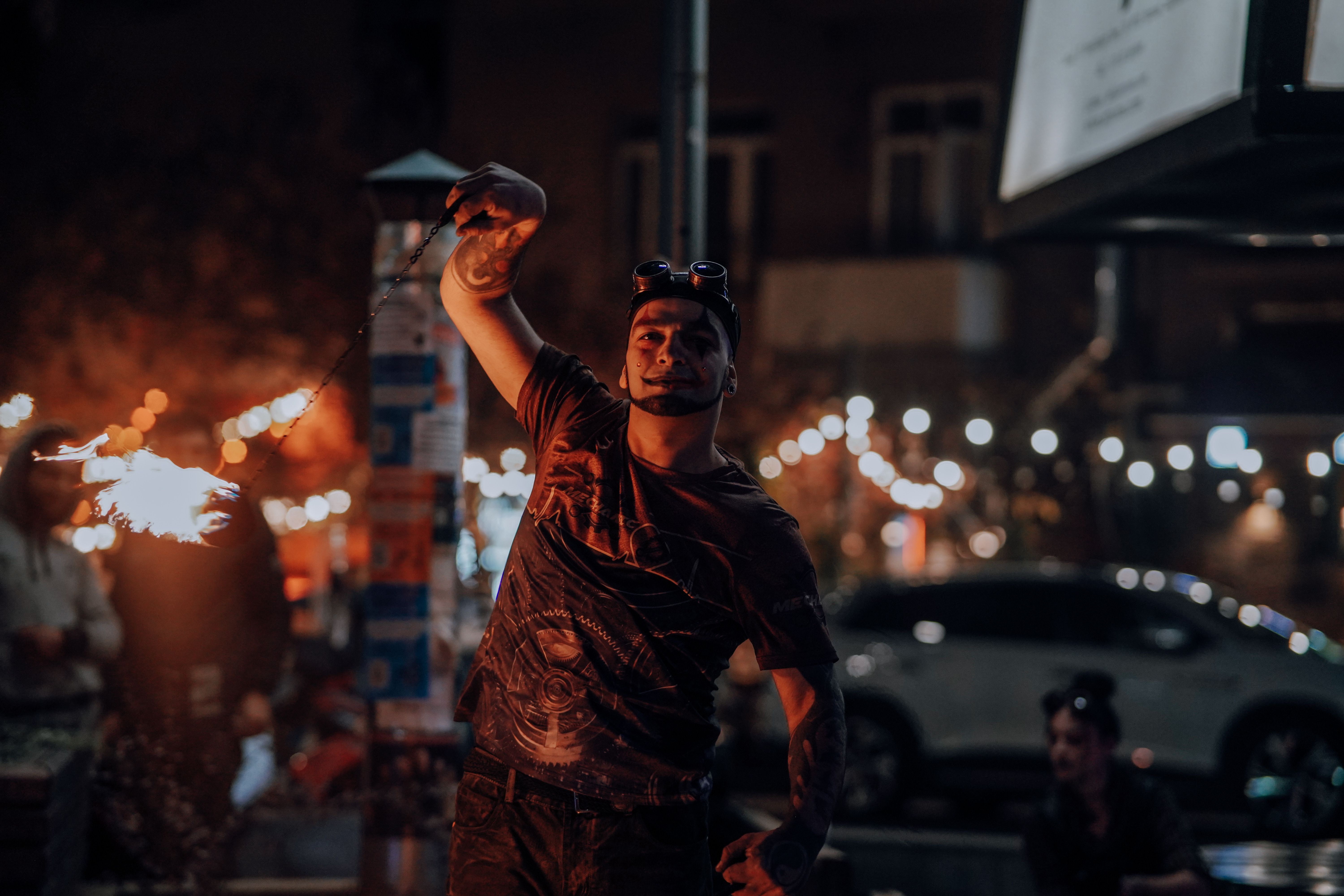 Man Dancing with Fire on the Street · Free Stock Photo