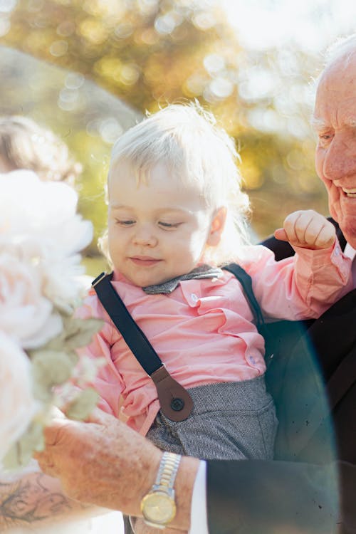 Grandfather Holding a Baby 