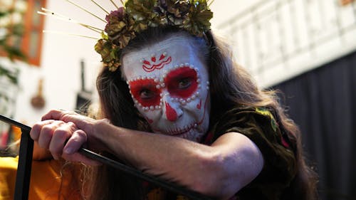 Woman Wearing Traditional Makeup for the Mexican Day of the Dead 