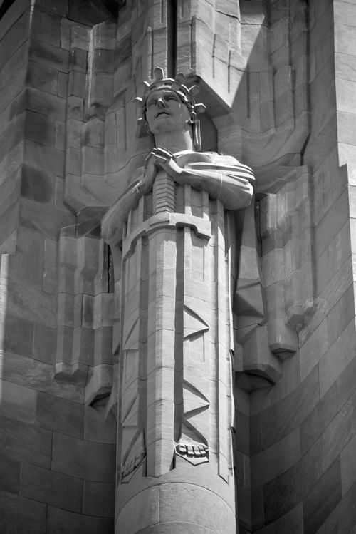 Free Close-up of a detailed stone sculpture on a historic monument facade in Kansas City. Stock Photo