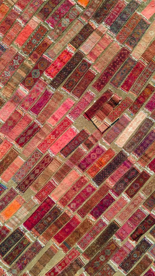 Free Colorful traditional Turkish rugs displayed outdoors in Killik, Antalya. Stock Photo