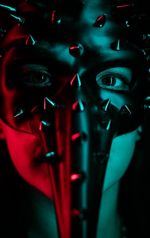 Woman Wearing a Mask with Studs 