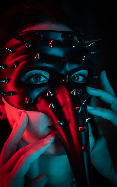 Woman Wearing a Mask with Studs 