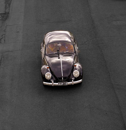A Vintage Volkswagen Beetle on the Street 