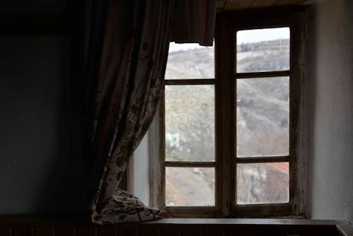 Curtain over Vintage Window in Room