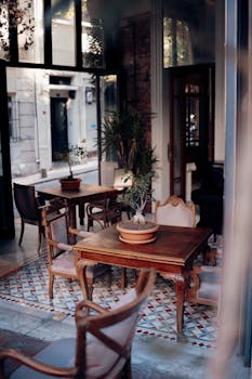 Charming café interior featuring vintage antique furniture and cozy ambiance.