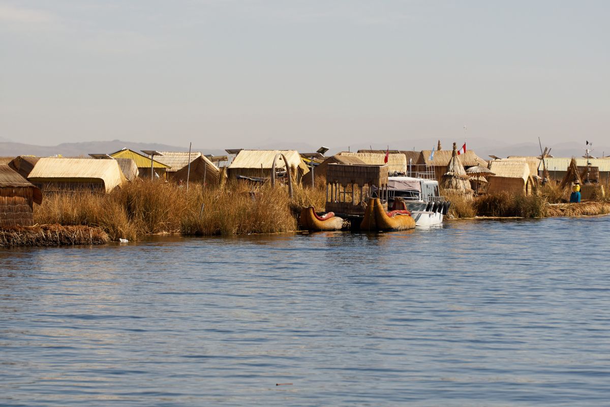 The Uros floating islands on Lake Titicaca — built layer by layer from totora reed, a tradition centuries old.