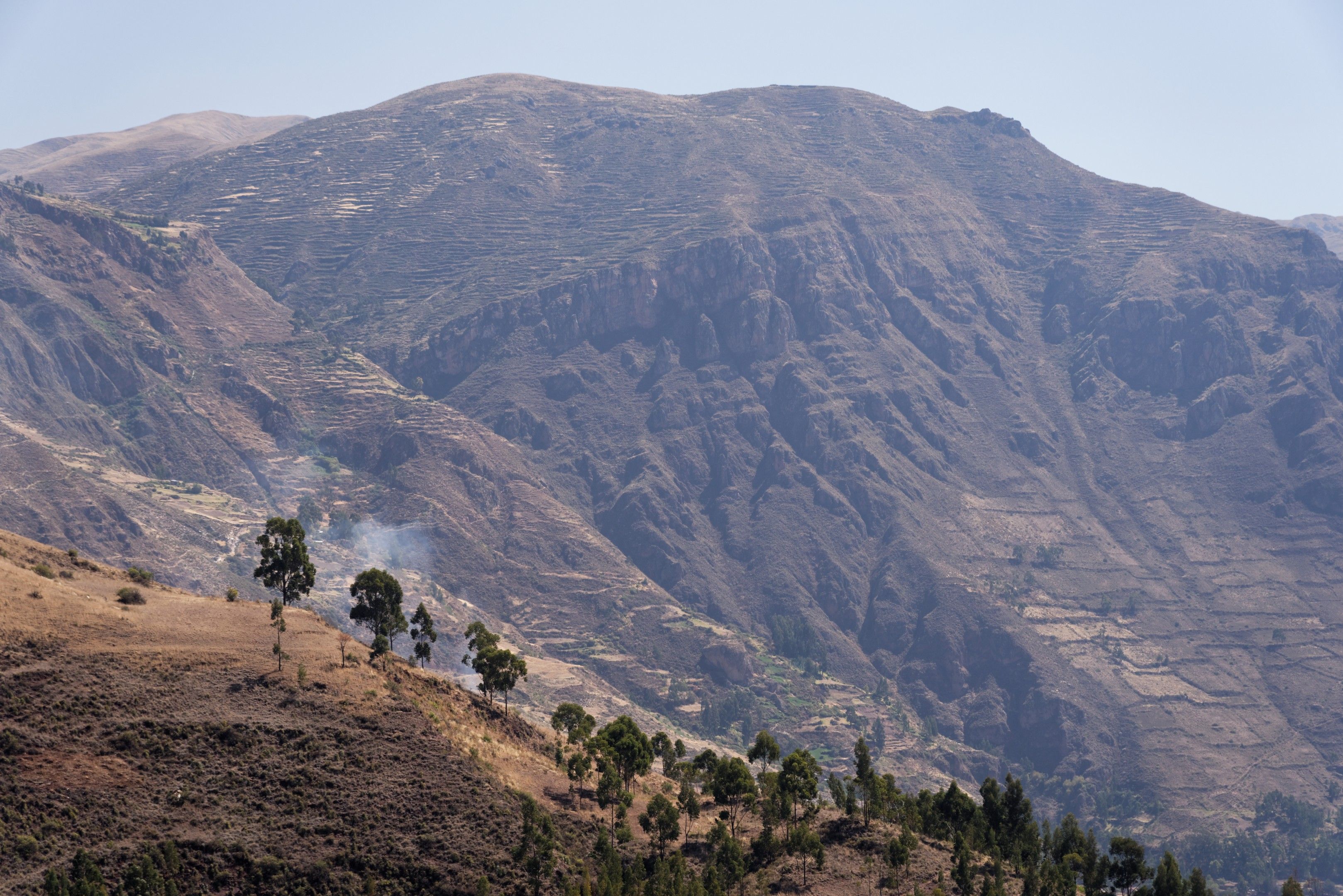 Captivating and rugged mountain landscape under bright daylight, showcasing natural beauty.