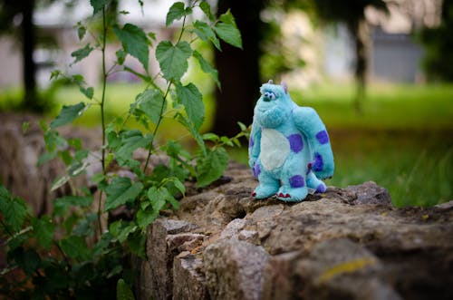 Teddy Sullivan Toy from Monsters Inc on Stone Wall
