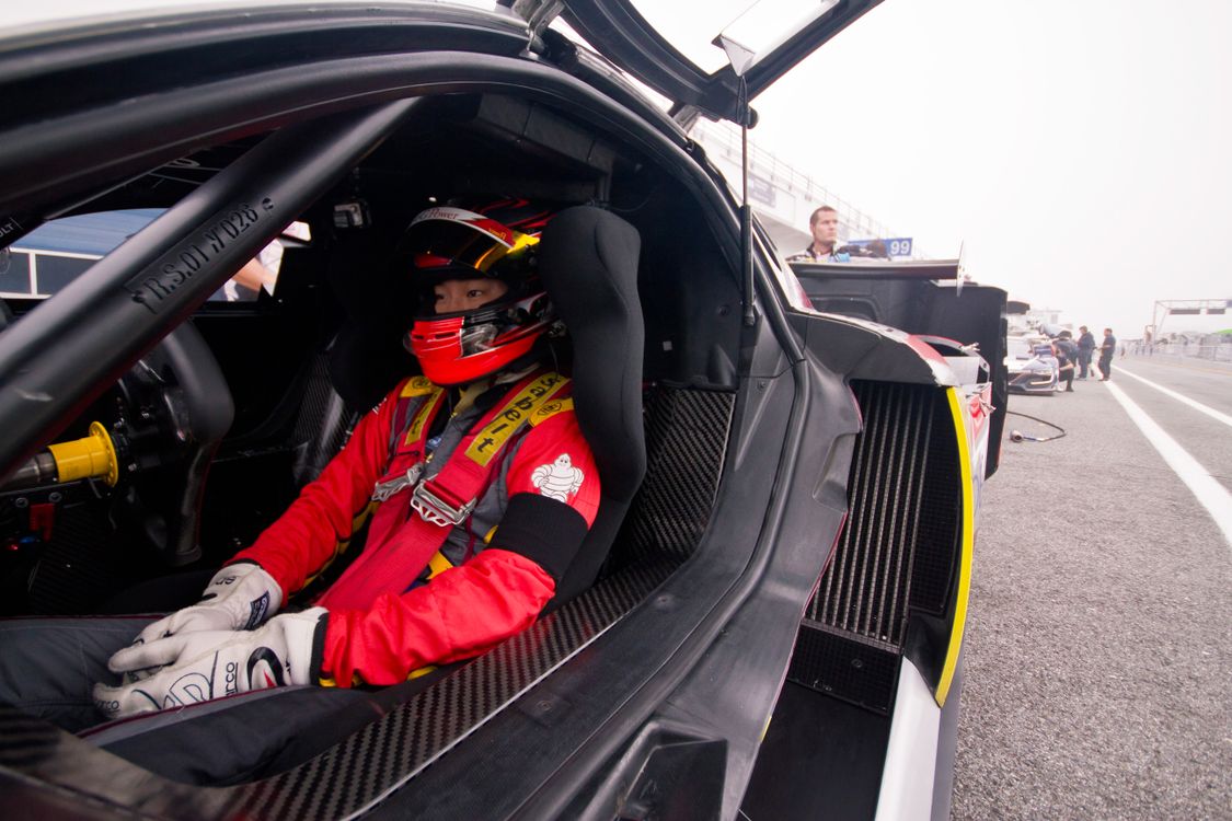 Driver Riding a Car During Championship · Free Stock Photo
