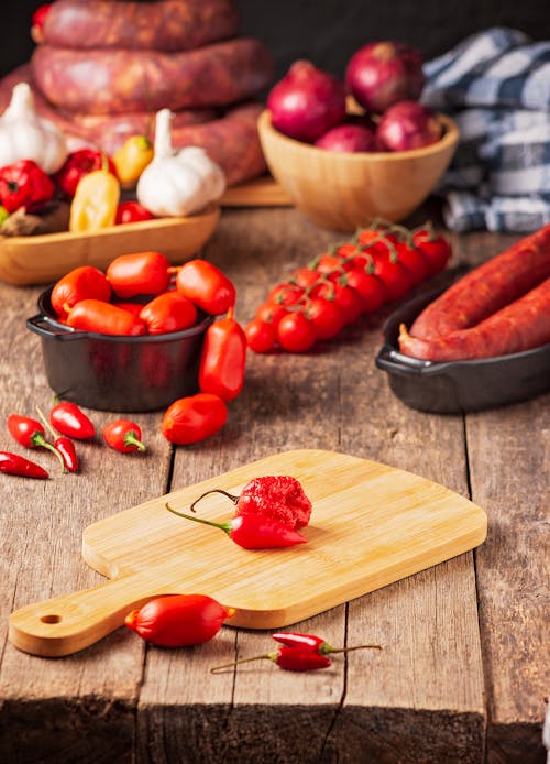 Red Peppers and Tomatoes on and around Tray