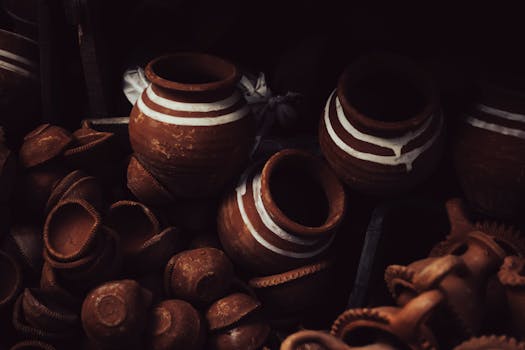 A collection of handcrafted Indian clay pots, showcasing traditional design and earthy tones.