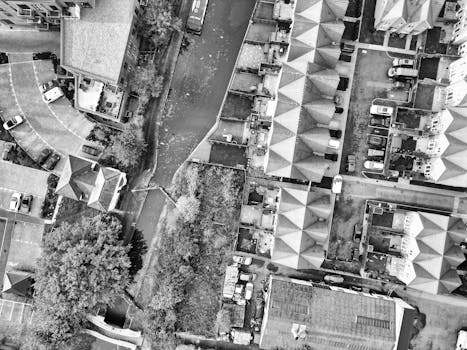 Explore urban layout of Hertfordshire town captured from above in stunning black and white.