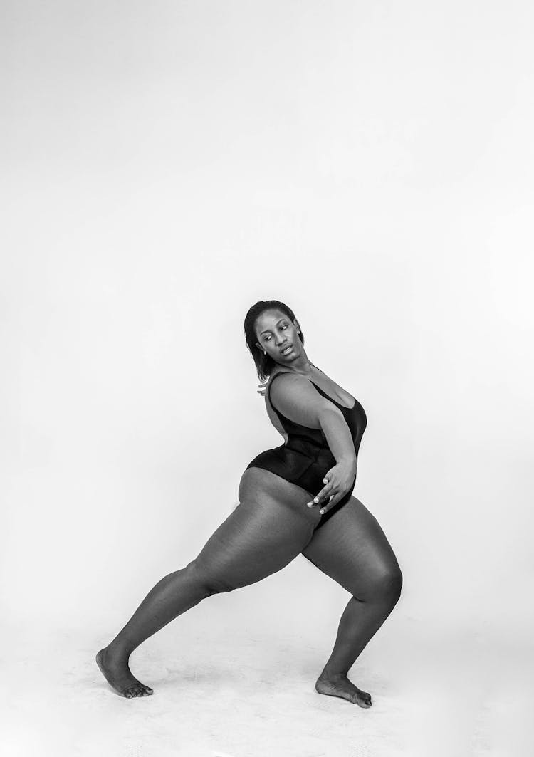 Monochrome Photography Of Woman Wearing Swimsuit