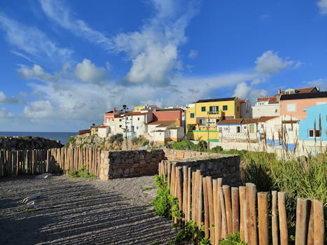 Picturesque seaside townscape in Peniche, Portugal with colorful houses and scenic views.