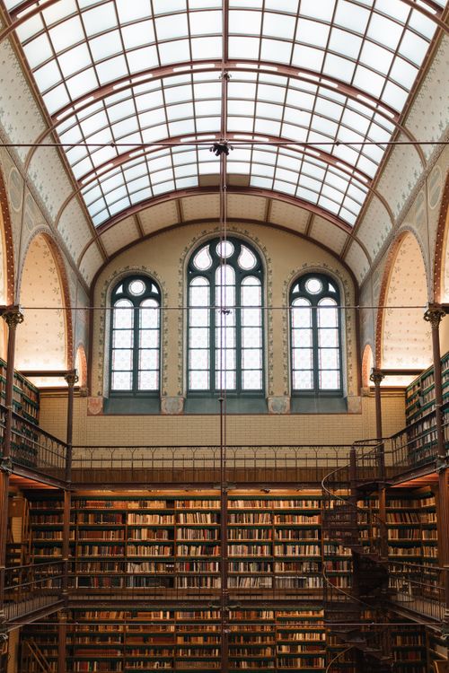 Free Discover the grand architecture and book collection of this historic Amsterdam library. Stock Photo