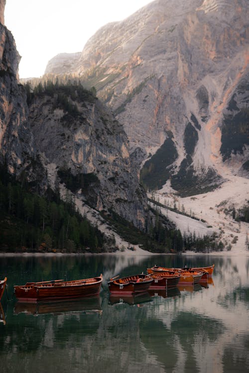 Boats on Lake in Mountains
