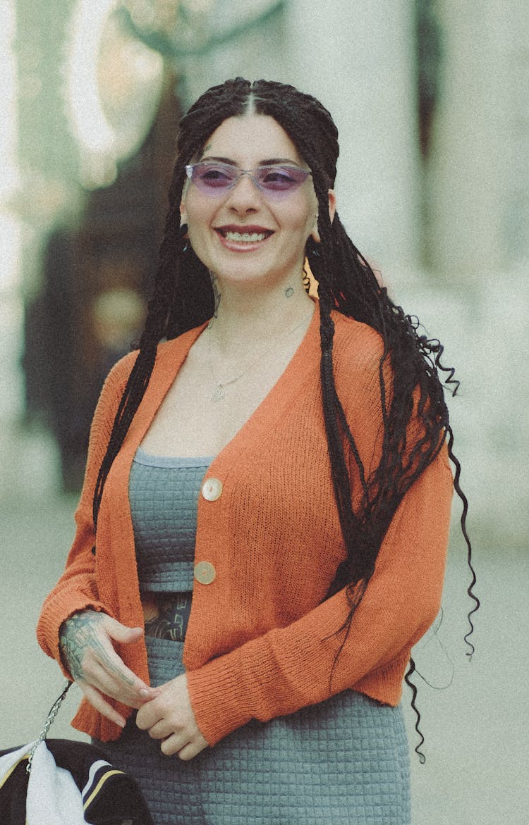 Portrait Of Smiling Woman With Black Hair