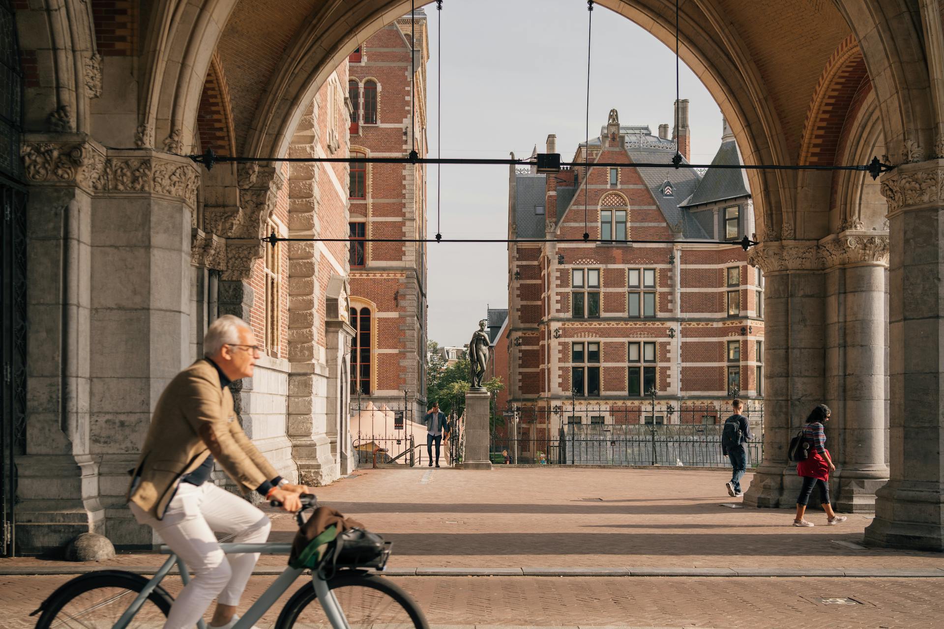 Man on a Bicycle on the Streets of Amsterdam, the Netherlands