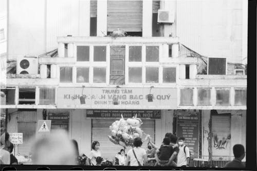 People near Building in Town in Vietnam