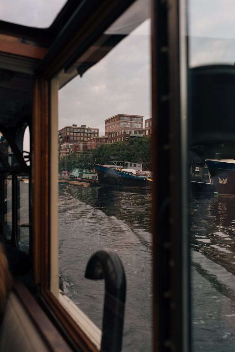 River Behind Boat Windows