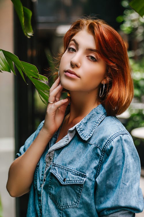 Selective Focus Photography of Blue Denim Collared Top