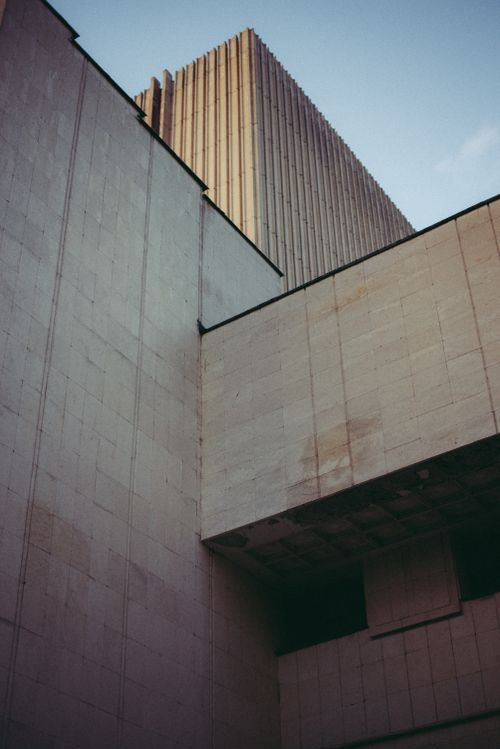 Free Contemporary skyscraper facade captured from a unique low angle perspective. Stock Photo