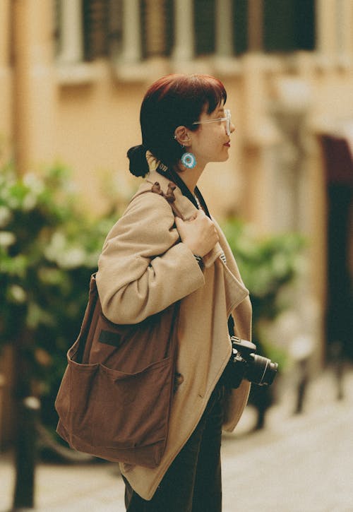 Woman with Bag and Camera