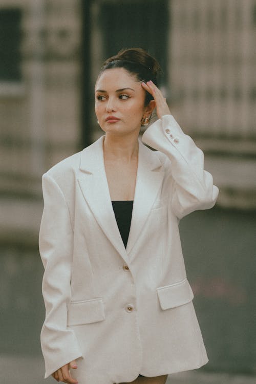 Portrait of Elegant Woman Wearing White Blazer 